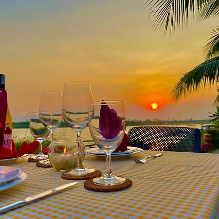 Bel Marina Hoi An Resort Dış mekan fotoğraf Sunset at the Riverine Restaurant